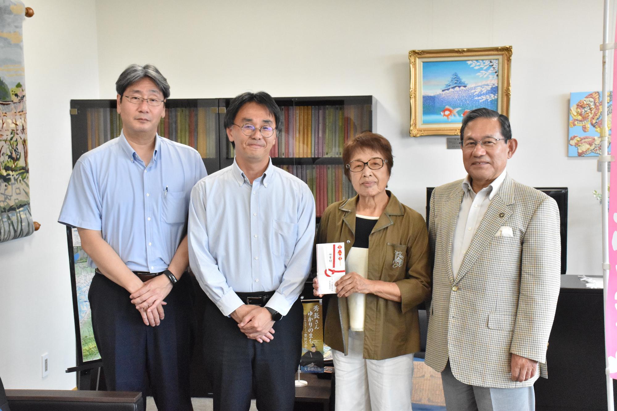 シャープ株式会社様から郡山城跡「桜」保存会への寄付受納式の様子